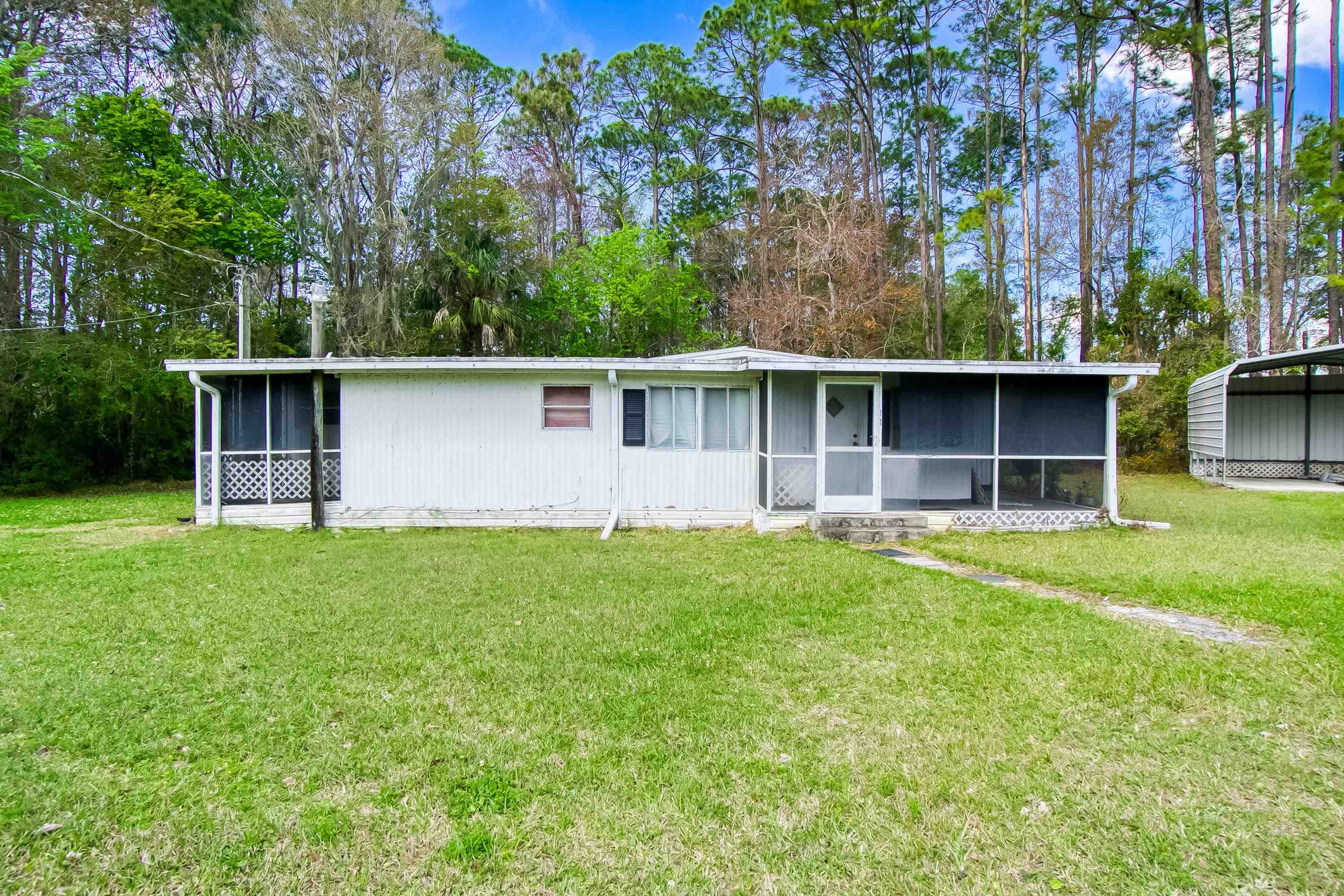2785 Stratton Boulevard St. Augustine, FL 32084 - Photo 11 of 25 a front view of house with yard and green space