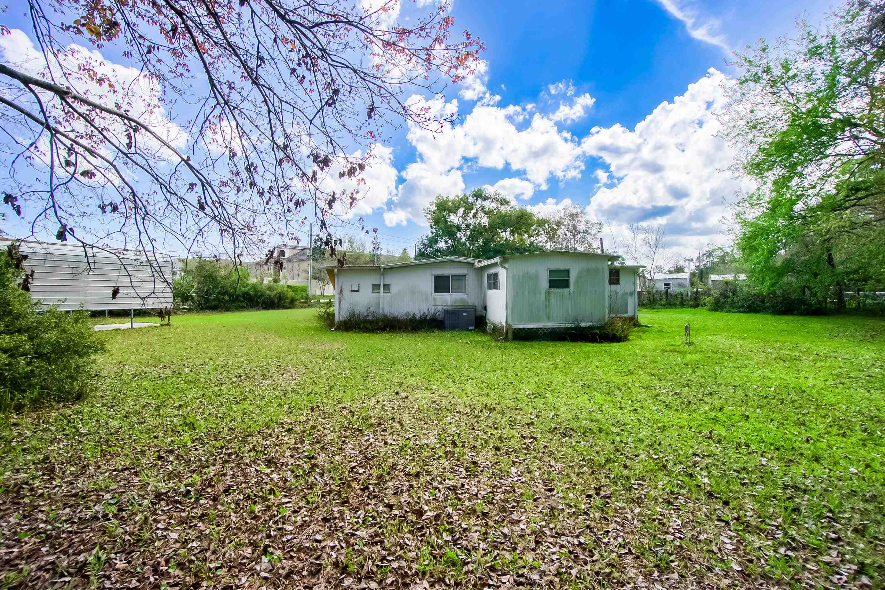 2785 Stratton Boulevard St. Augustine, FL 32084 - Photo 14 of 25 Back of house with a yard
