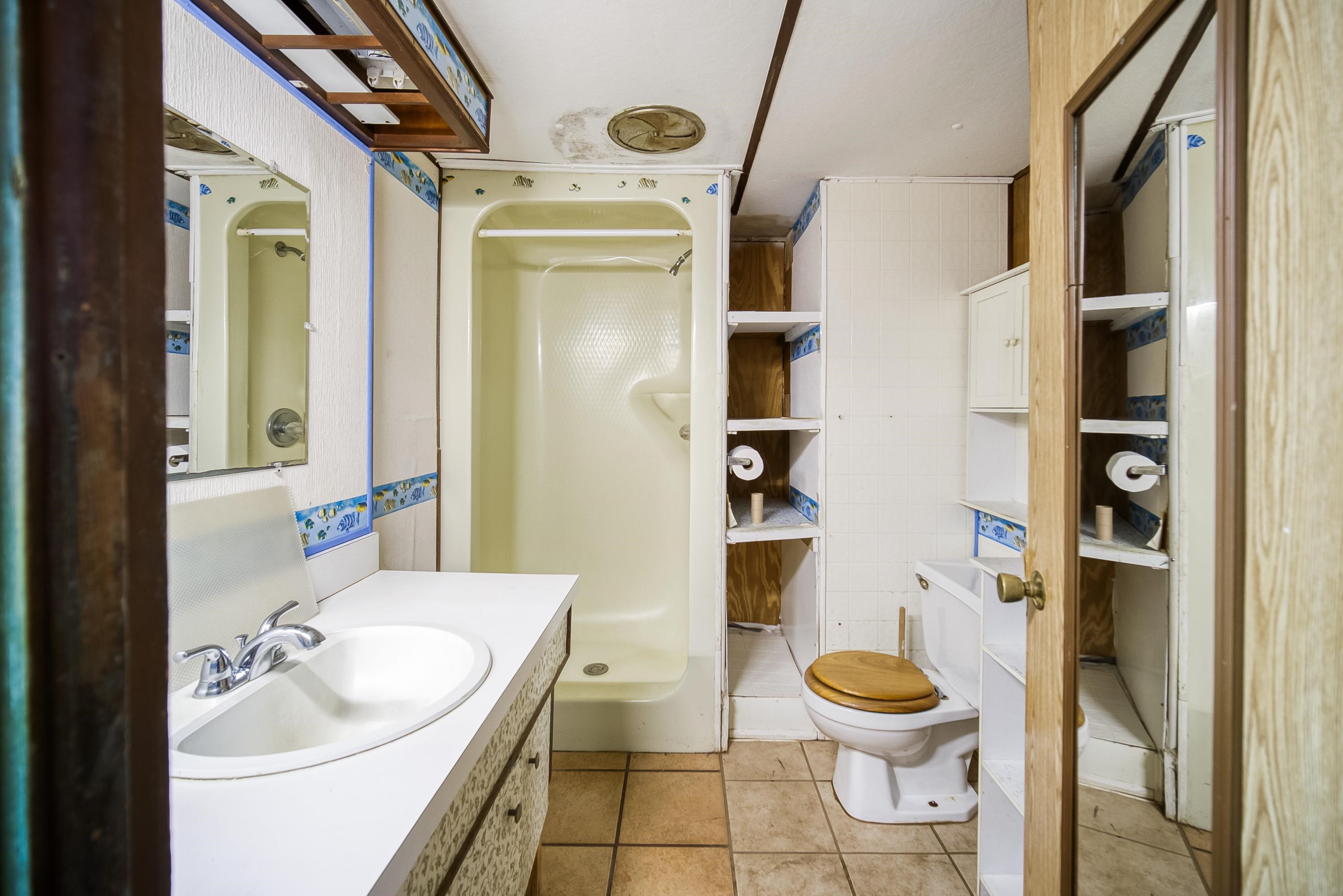 2785 Stratton Boulevard St. Augustine, FL 32084 - Photo 25 of 25 a bathroom with a sink toilet and shower