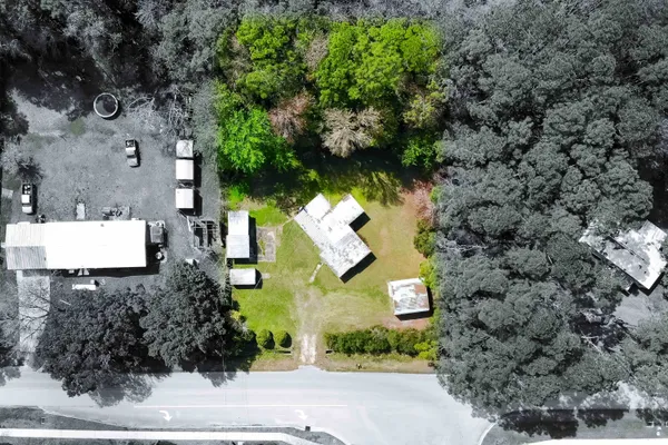 a view of a backyard with a small cabin