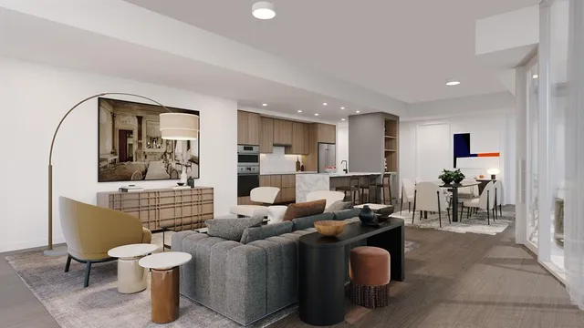 a living room with furniture a mirror and a table