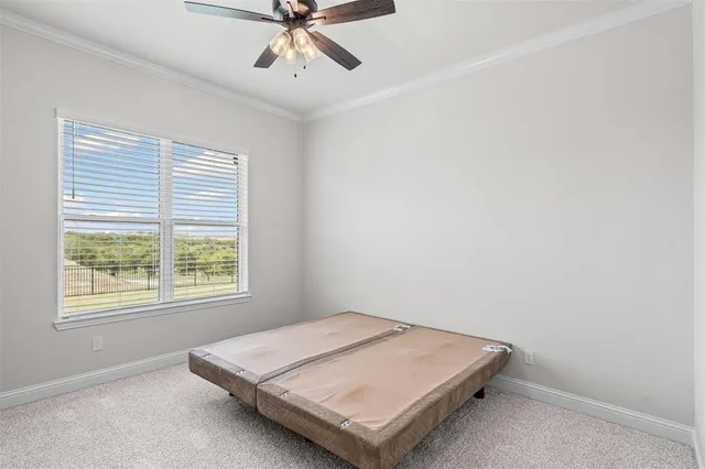 a bathroom with a sink a toilet a mirror and shower