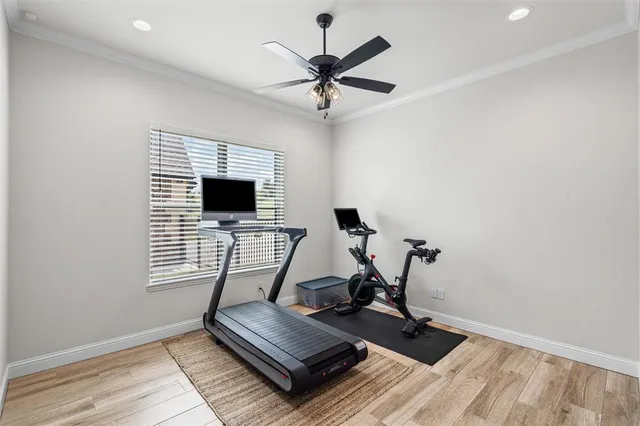a bathroom with a sink a toilet a mirror and shower