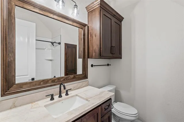 a bathroom with a bathtub and a window