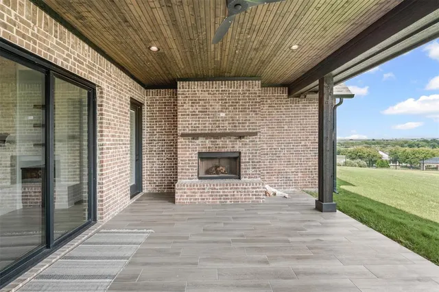 a view of a large garden with large trees and a houses