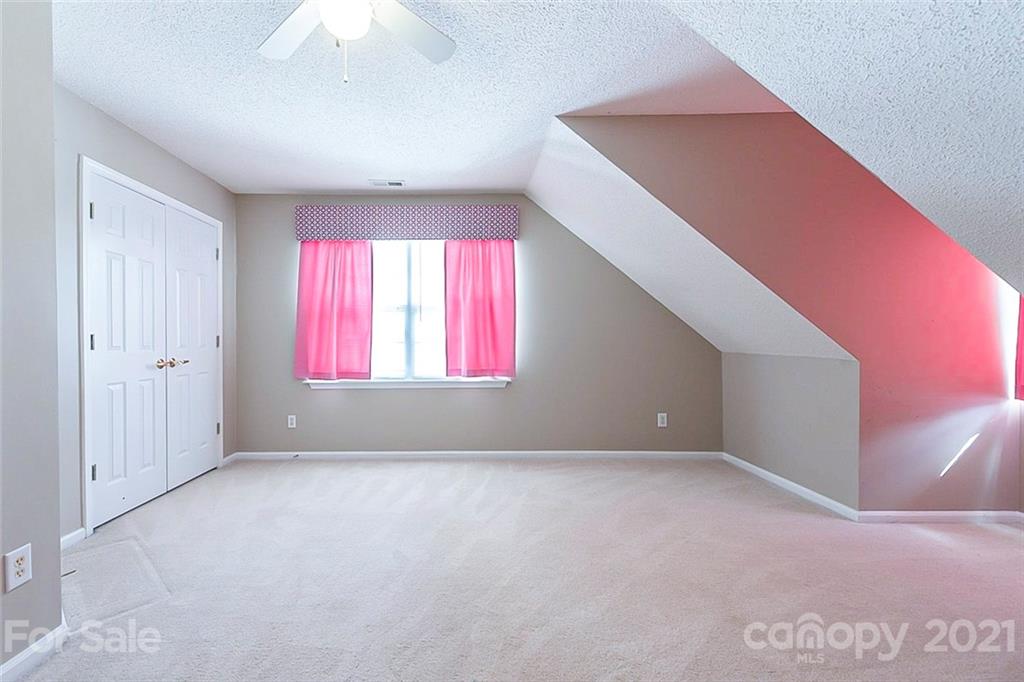 943 Knightsbridge Road Fort Mill, SC 29708 - Photo 13 of 21 a view of an empty room with a window