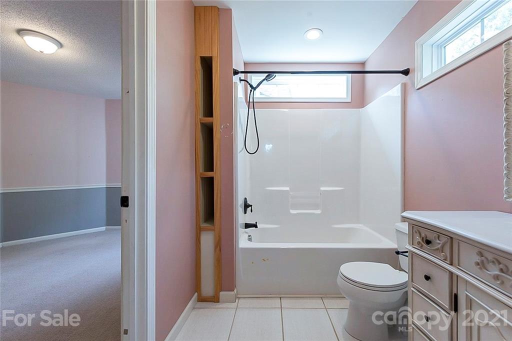 943 Knightsbridge Road Fort Mill, SC 29708 - Photo 15 of 21 a bathroom with a sink toilet and shower