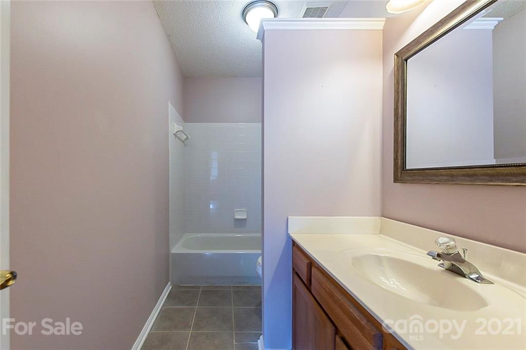 943 Knightsbridge Road Fort Mill, SC 29708 - Photo 17 of 21 a bathroom with a sink and a mirror