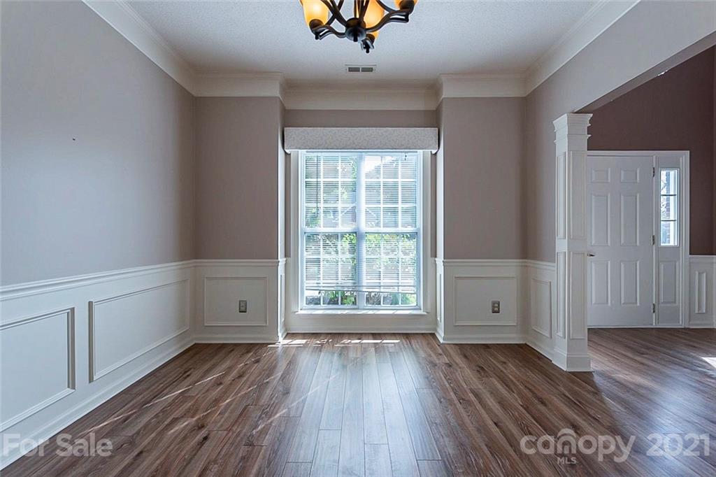943 Knightsbridge Road Fort Mill, SC 29708 - Photo 8 of 21 wooden floor in an empty room with a window