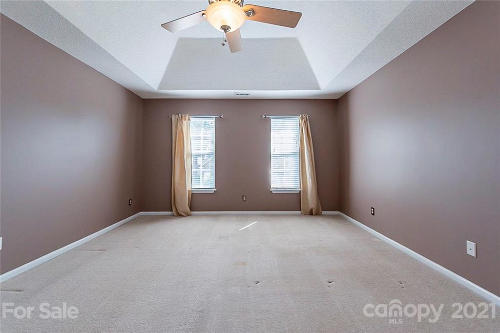 943 Knightsbridge Road Fort Mill, SC 29708 - Photo 9 of 21 an empty room with windows and fan