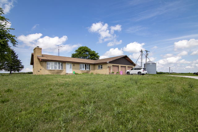 3740 North 1300e Road Kempton, IL 60946 - Photo 2 of 7 a view of a house with a big yard plants and large trees