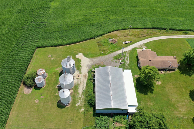 3740 North 1300e Road Kempton, IL 60946 - Photo 6 of 7 a view of swimming pool with a garden