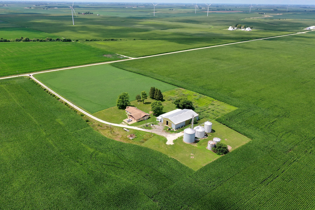 3740 North 1300e Road Kempton, IL 60946 - Photo 7 of 7 a backyard of a house with table and chairs