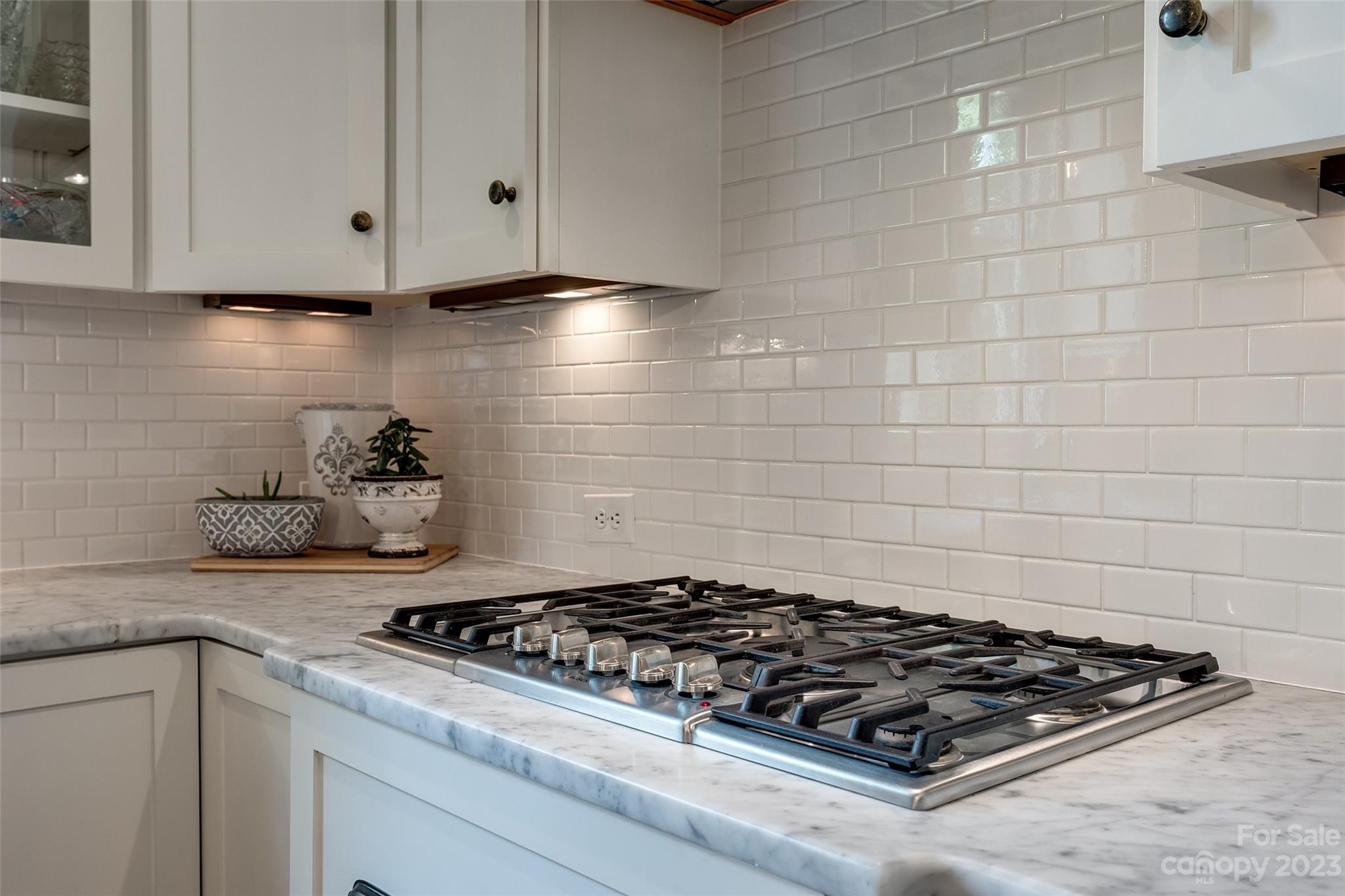 3213 Fifth Baxter Crossing Fort Mill, SC 29708 - Photo 12 of 30 a stove top oven sitting inside of a kitchen