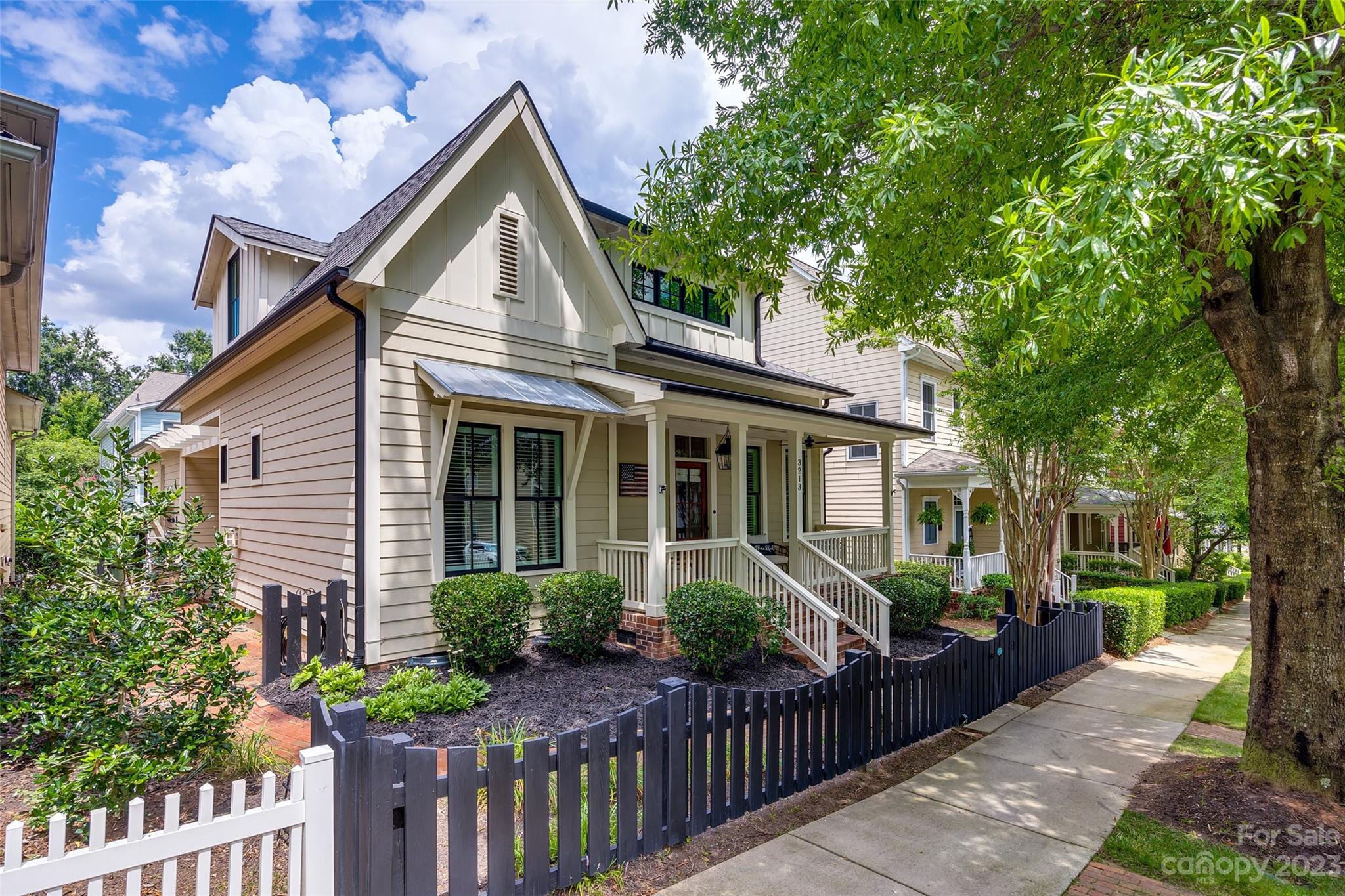 3213 Fifth Baxter Crossing Fort Mill, SC 29708 - Photo 30 of 30 a front view of a house with garden