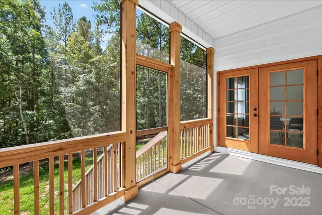 a view of a large window with wooden floor