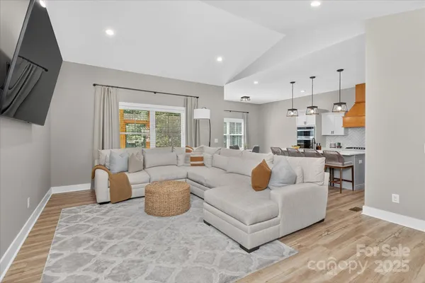 a living room with furniture and a couch