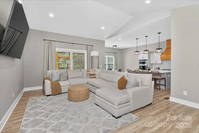 a living room with furniture and a couch