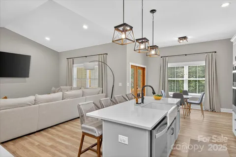 a view of a livingroom with furniture and window