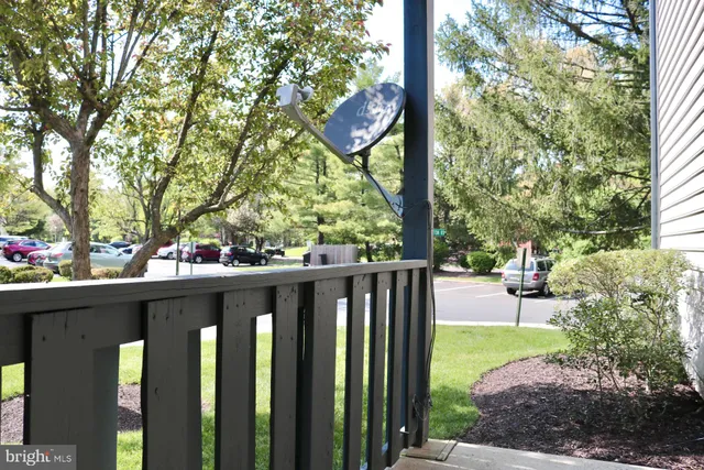a bathroom with a sink and bathtub with toilet