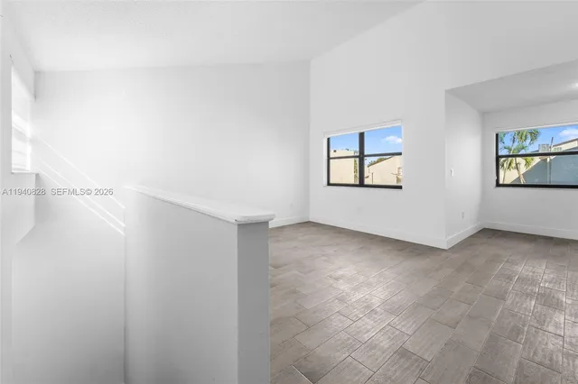 an empty room with windows