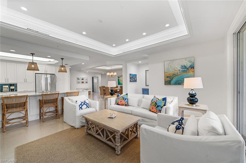 a living room with furniture and a table