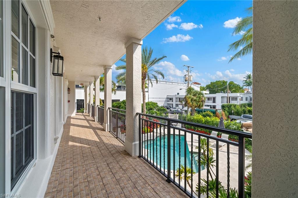 411 6th Street South, Unit 202 Naples, FL 34102 - Photo 27 of 35 a view of a city from a balcony