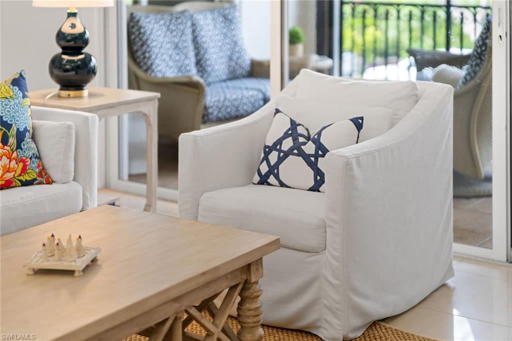 411 6th Street South, Unit 202 Naples, FL 34102 - Photo 33 of 35 a living room with furniture and window