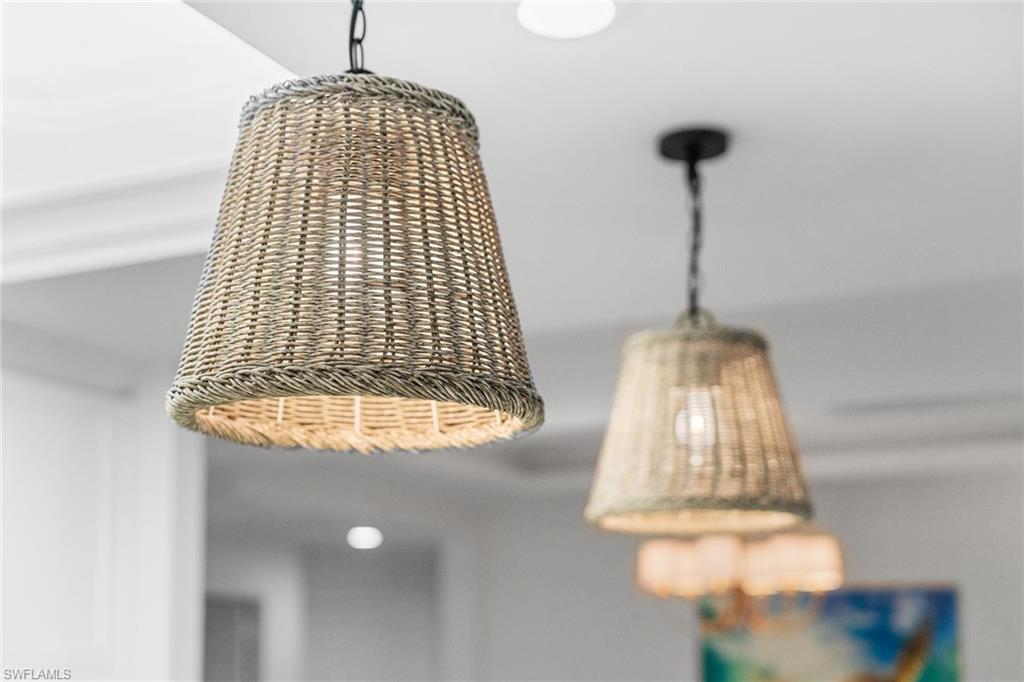 411 6th Street South, Unit 202 Naples, FL 34102 - Photo 34 of 35 a vase of flowers sitting on a table