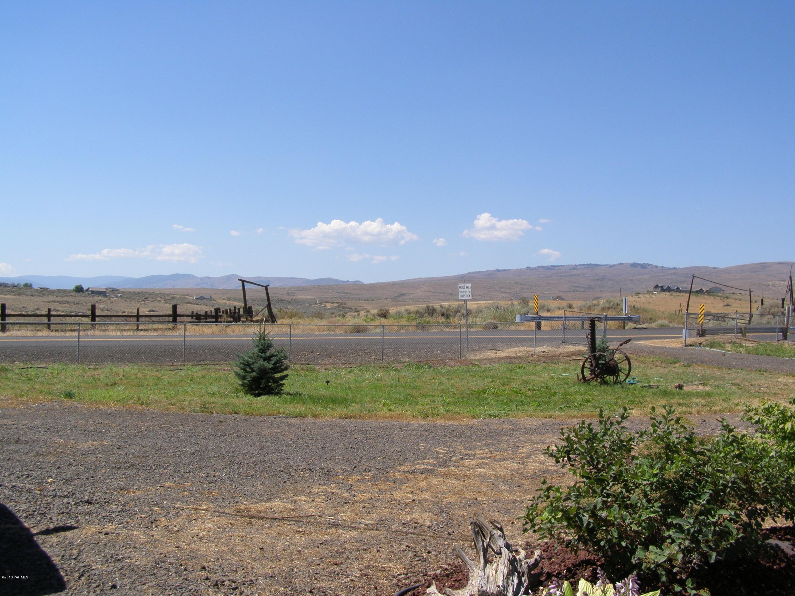 2511 Cook Road Yakima, WA 98908 - Photo 4 of 27 a view of a lake with a big yard