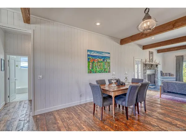 a open kitchen with stainless steel appliances granite countertop a stove and cabinets