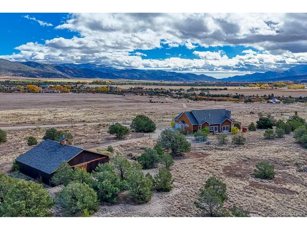 a view of houses with outdoor space and street view