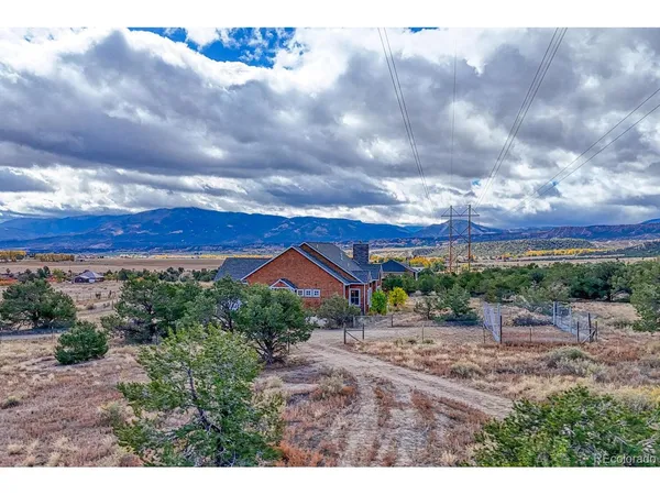a workspace room with furniture