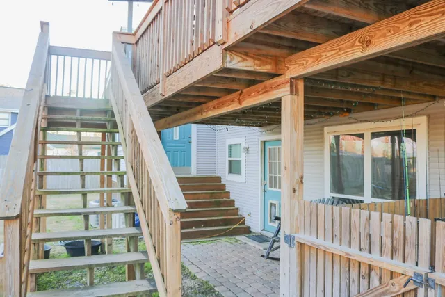 a view of staircase with large window