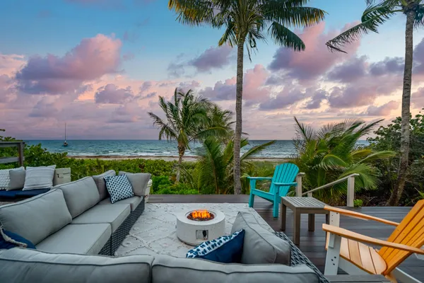 a view of swimming pool with a patio and a garden