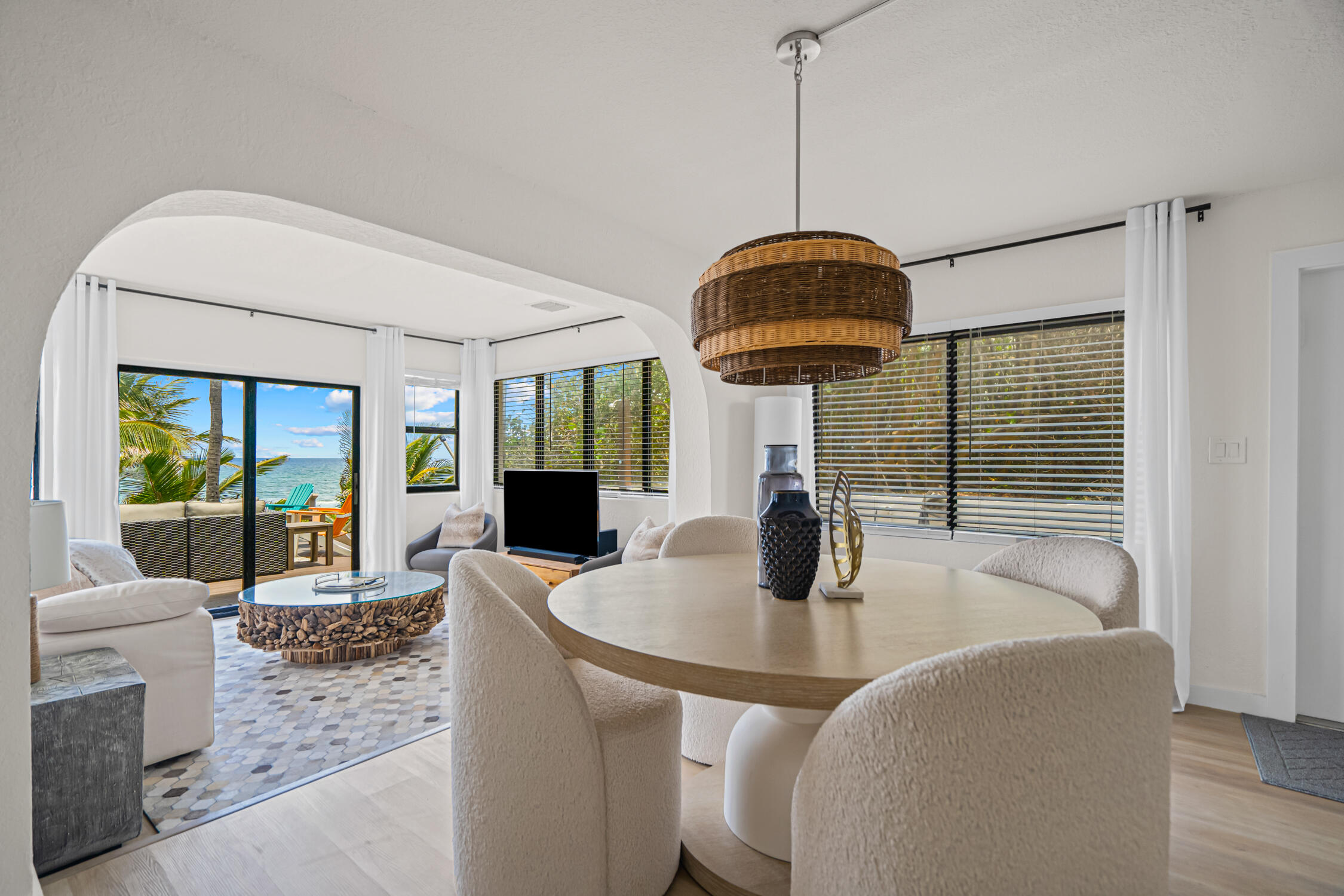 2330 North Ocean Boulevard Boca Raton, FL 33431 - Photo 11 of 31 a kitchen with a table and chairs