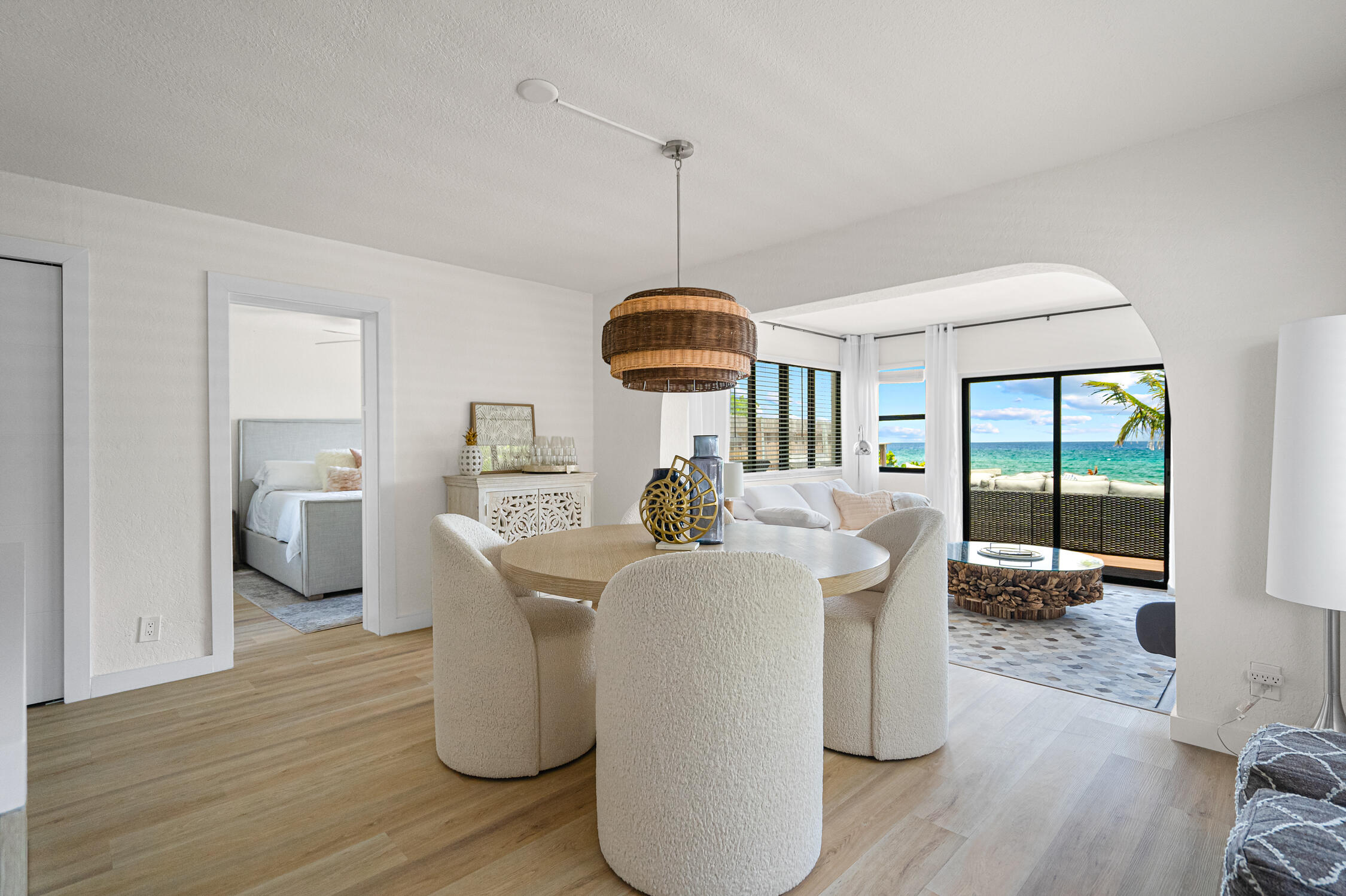 2330 North Ocean Boulevard Boca Raton, FL 33431 - Photo 25 of 31 a dining room with furniture and wooden floor