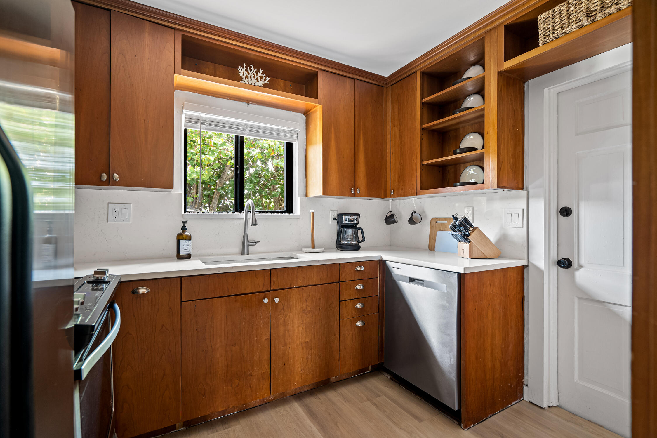 2330 North Ocean Boulevard Boca Raton, FL 33431 - Photo 26 of 31 a kitchen with a sink cabinets and window