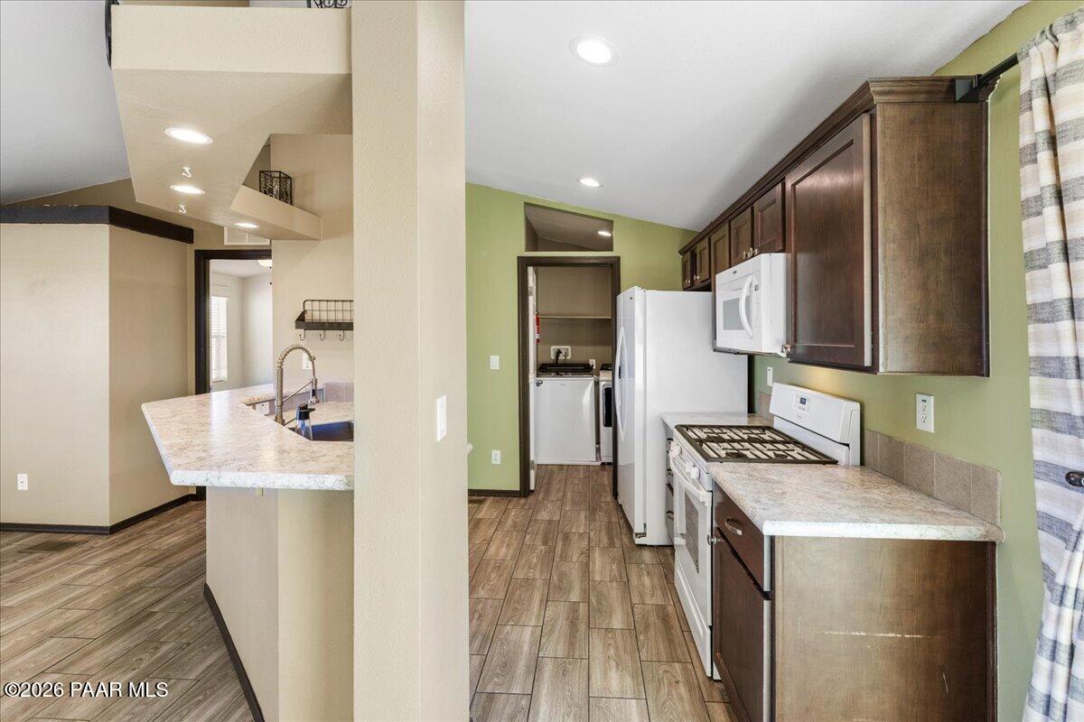 325 East Houston Road Paulden, AZ 86334 - Photo 12 of 40 a kitchen with a sink stove and refrigerator
