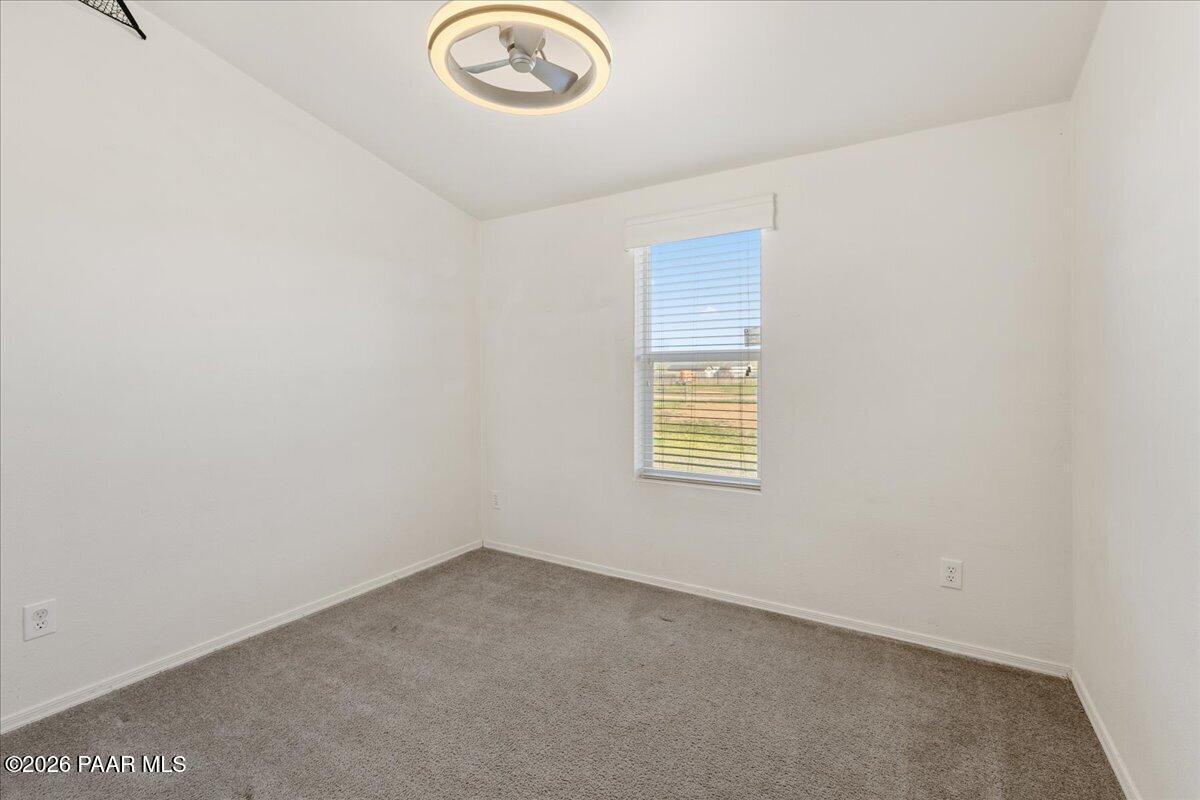 325 East Houston Road Paulden, AZ 86334 - Photo 18 of 40 an empty room with a window