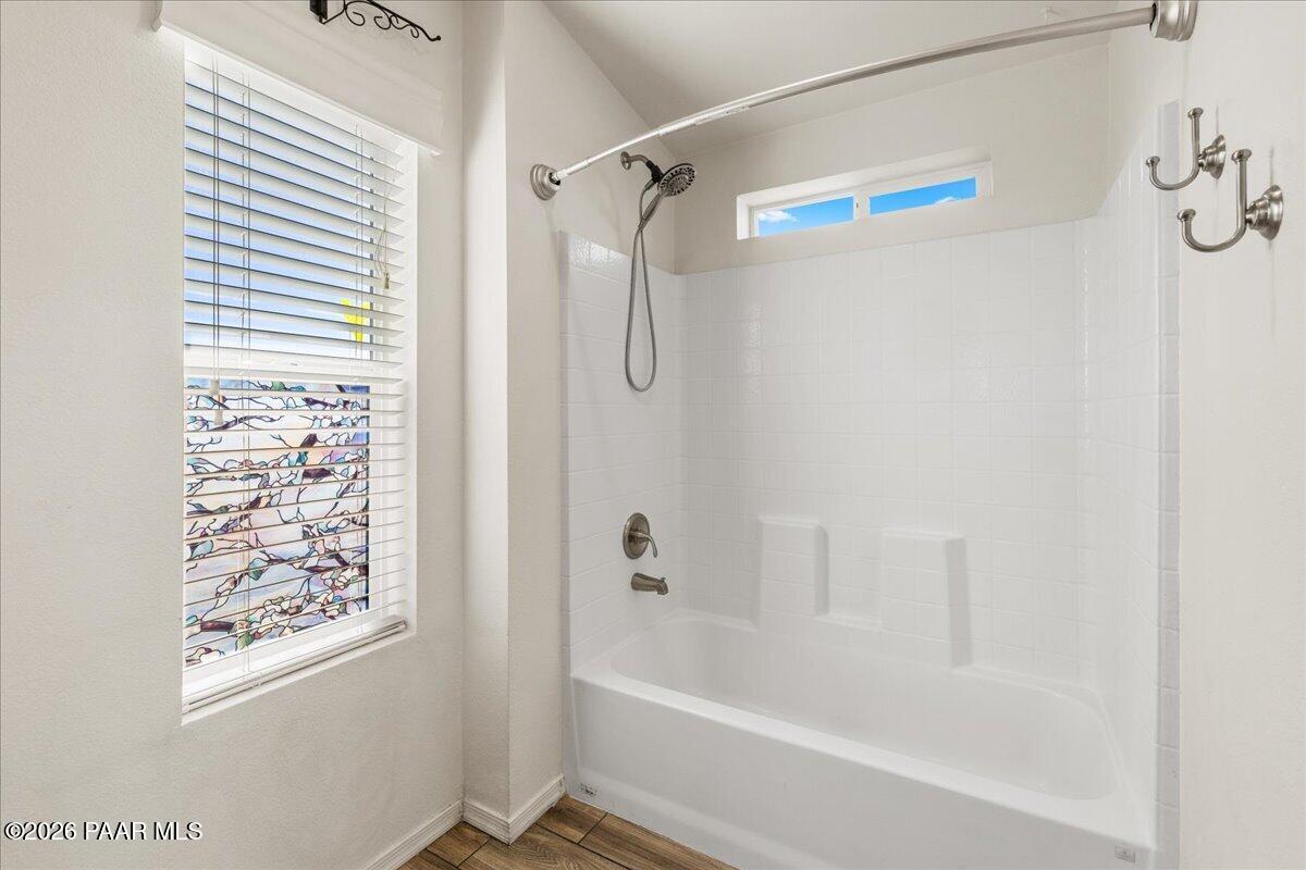 325 East Houston Road Paulden, AZ 86334 - Photo 24 of 40 a bathroom with a shower and a bath tub