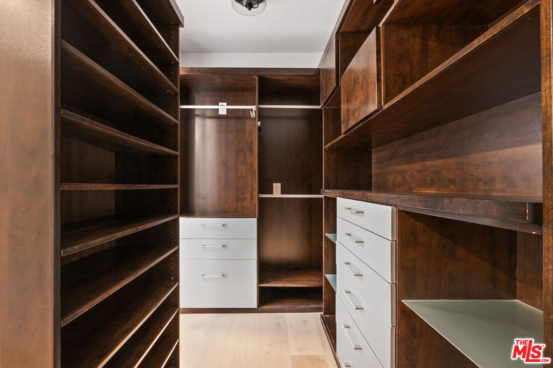 1100 Alta Loma Road, Unit 902 West Hollywood, CA 90069 - Photo 7 of 17 a view of walk in closet