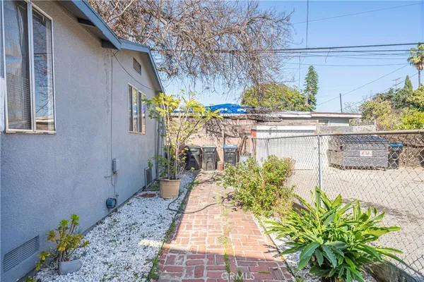 a outdoor view with a table and chairs