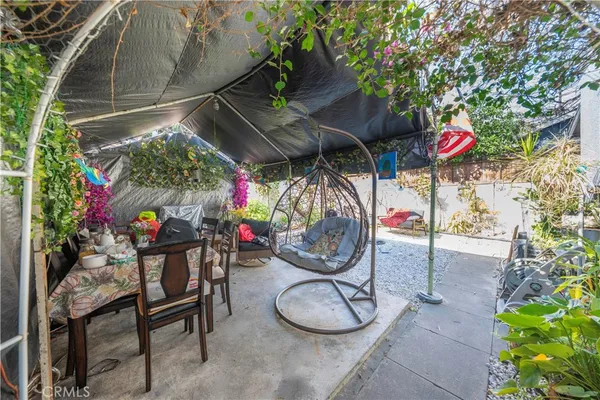 a lobby with furniture and potted plant