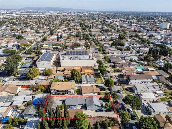 an aerial view of a city with lots of residential buildings