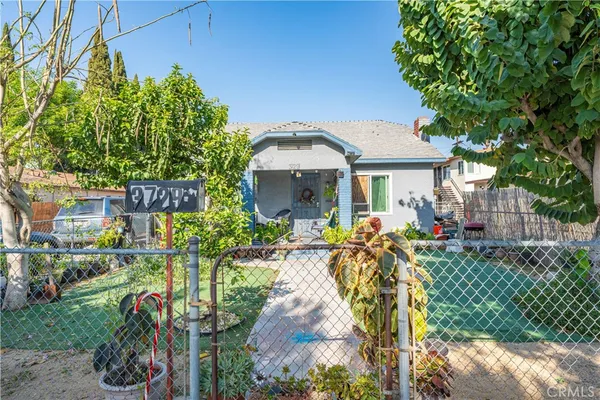 a front view of a house with a garage