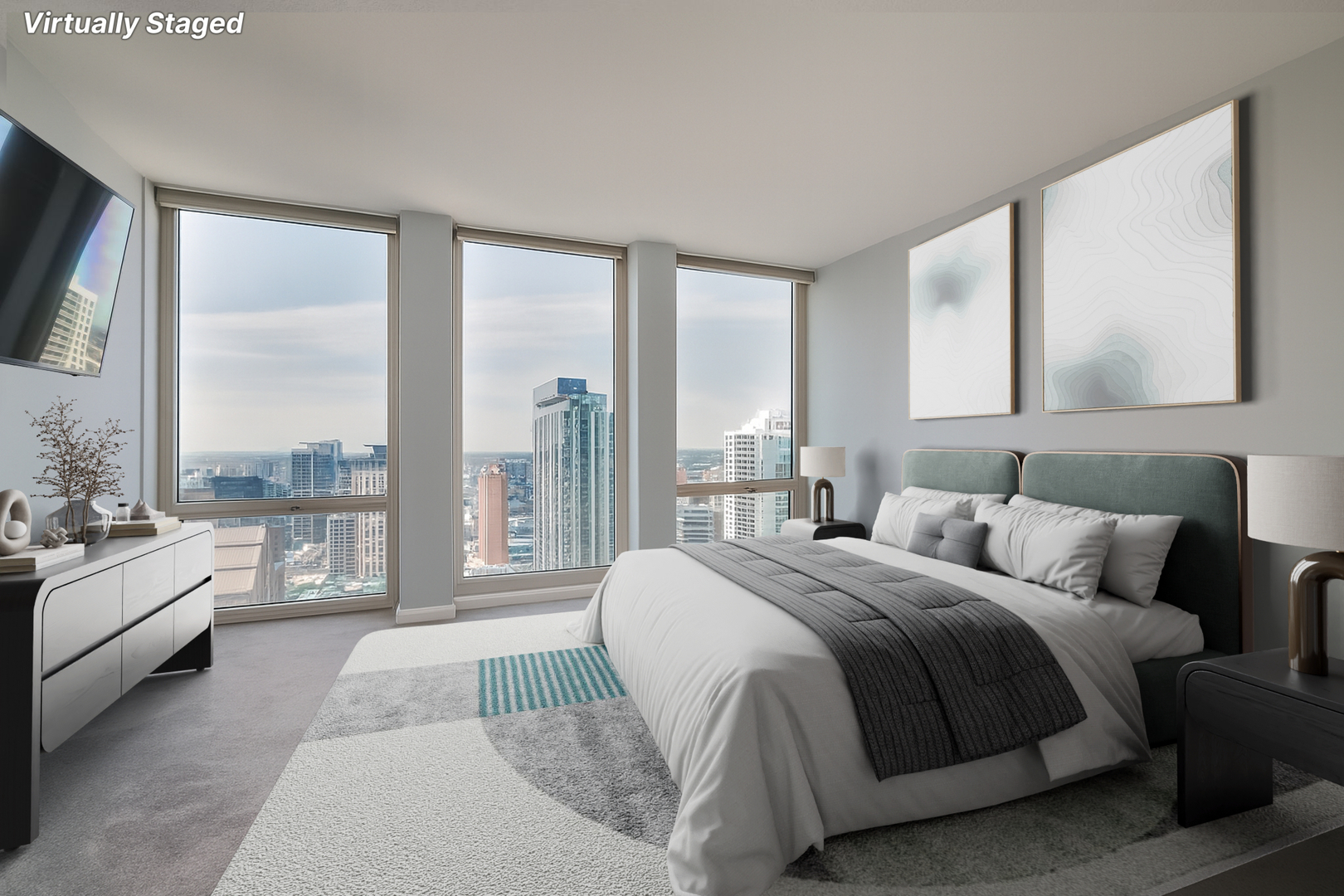 111 East Chestnut Street, Unit 37K Chicago, IL 60611 - Photo 23 of 37 a bedroom with a large bed and a large window