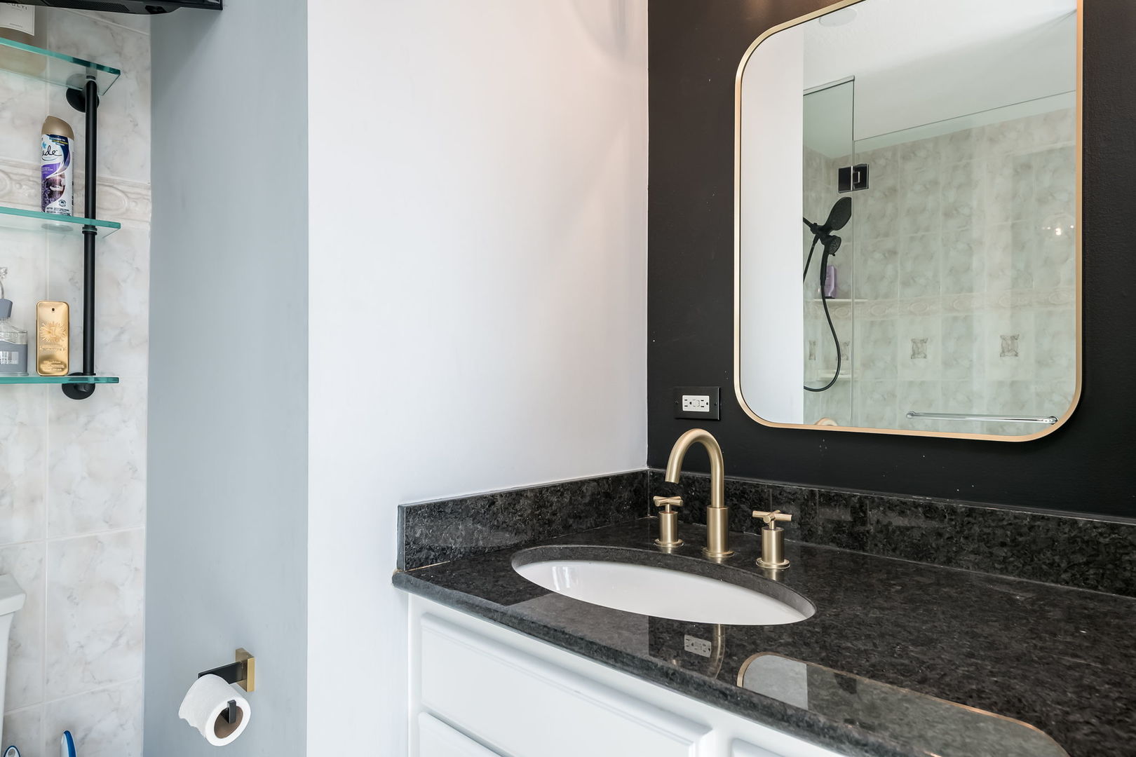 111 East Chestnut Street, Unit 37K Chicago, IL 60611 - Photo 25 of 37 a bathroom with a sink and a mirror