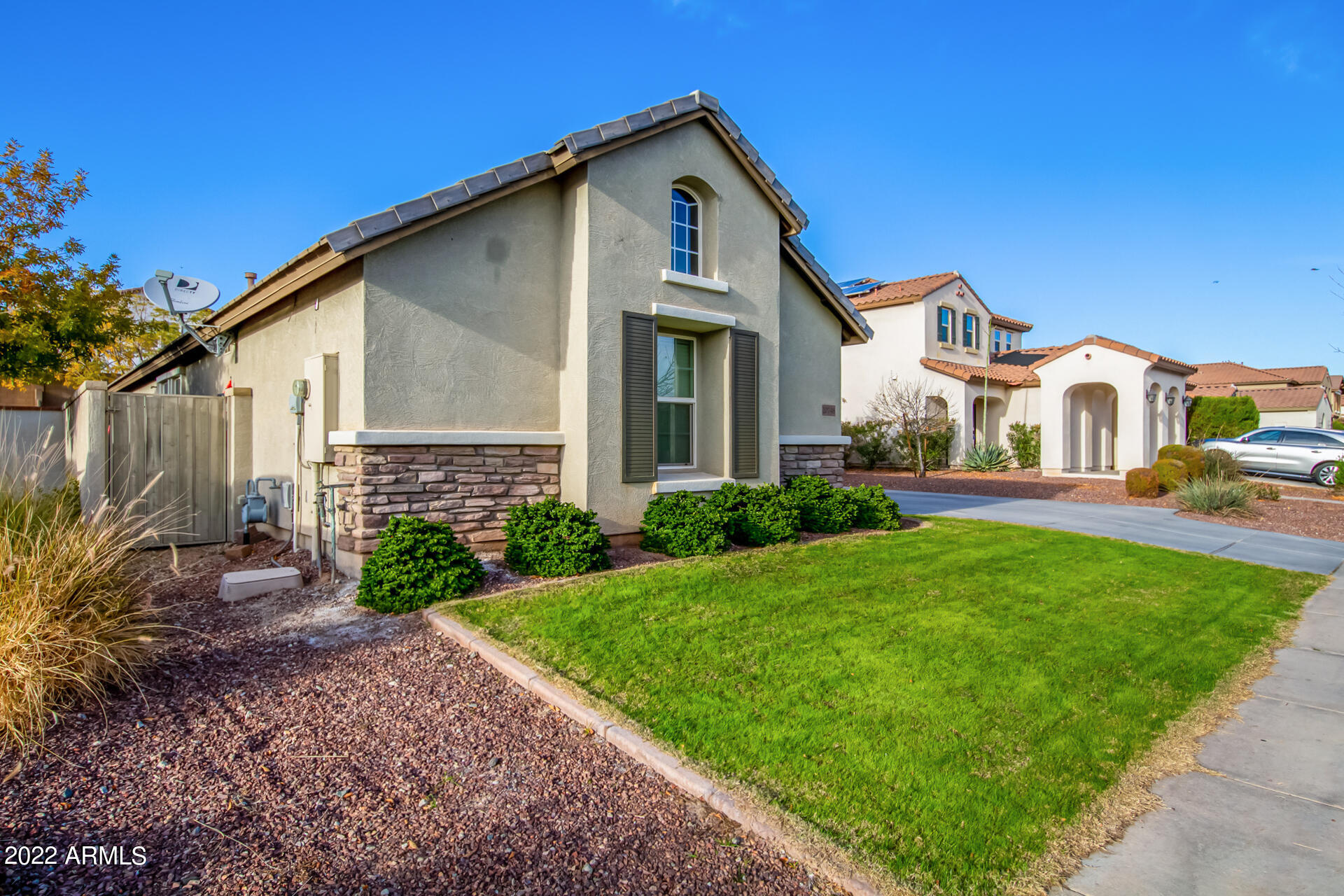 20748 West White Rock Road Buckeye, AZ 85396 - Photo 3 of 34 a front view of a house with garden