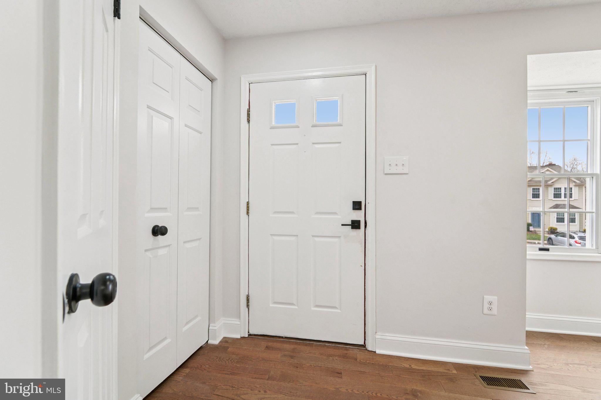 8727 Silver Hall Road Perry Hall, MD 21128 - Photo 2 of 35 a view of a bathroom with wooden floor
